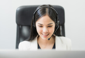 Young business asian woman working call centre customer service agents. Business female support...