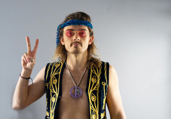 hippie young man with peace sign
