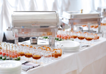 catering food on table glasses and plates