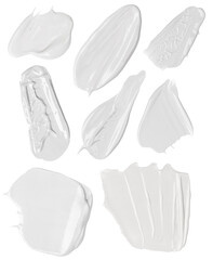 white swatches of face cream on white background