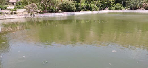 river that is across the historical town hampi , lakes