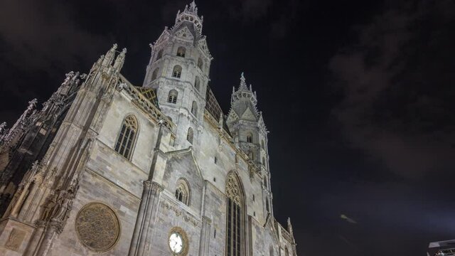 St. Stephen's Cathedral night timelapse hyperlapse (Stephansdom, Domkirche St. Stephan), the mother church of Roman Catholic Archdiocese of Vienna and one of the tallest churches in the world