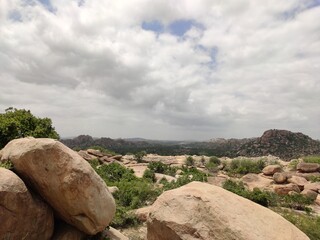 landscape view of rocks and hills in hampi 