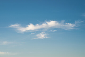 Clear cirrus clouds high up in the sky