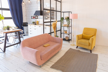 luxury modern design of a cozy small Scandinavian-style studio apartment with white walls, second...