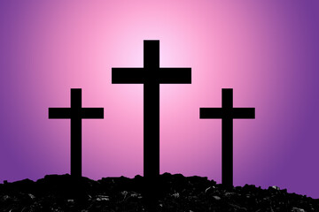 Silhouette Cross Crucifixion Of Jesus Christ on the mountain with Dark Purple and Pink background...