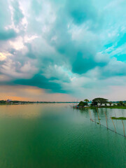River of Bangladesh during the rainy season with clouds on the sky