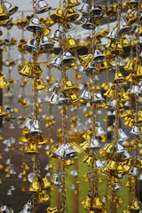 Fototapeta na wymiar Many bells are hung to decorate the place.