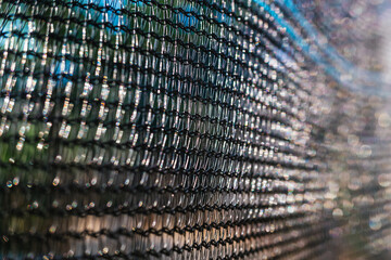 Close-up detail of the knots of a fine-mesh nylon mesh.