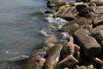 Sea pebble. Sea stones background. Ocean beach rocks.