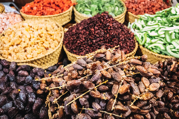 Pile of dates and nuts for sale at a natural food stall.