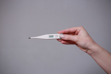 Thermometer in hand