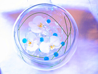 fake flowers in a bowl