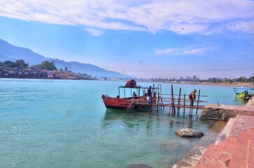 Boats in bay of Ganga river in Uttarakhand, India.