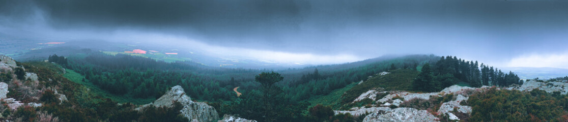 Stormy clouds panorama on top of mountain