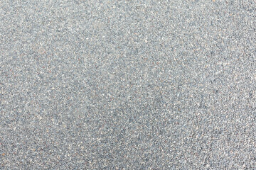 Abstract background of dry round stones in wide angle