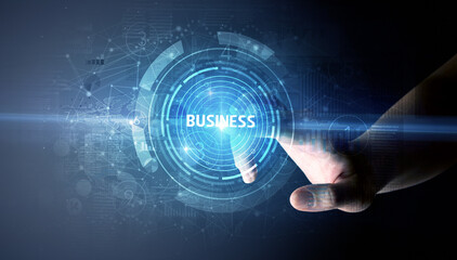 Hand touching BUSINESS button, modern business technology concept
