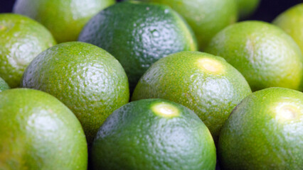 Texture pattern juicy green tropical lime fruit. Image green limes