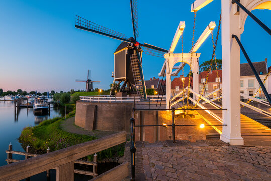 Draw Bridge and Windmills in Heusden Netherlands at Dusk