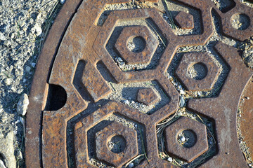 A Rusted Storm Drain Lid