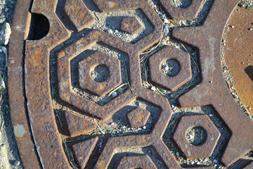A Rusted Storm Drain Lid