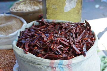 Sack of dried Red chili pepper at traditional vegetable market