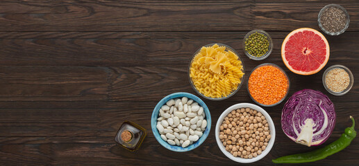 Fototapeta na wymiar banner of products balanced nutrition legumes, vegetables, herbs, top view