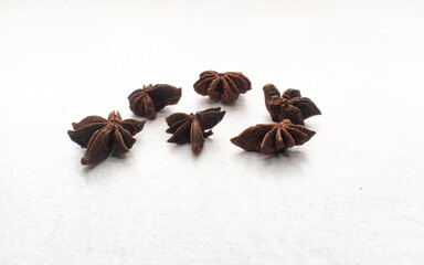 Old Star anise (Illicium verum) on a White Table in Medellin, Antioquia / Colombia