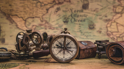Fototapeta na wymiar Antique Nautical Compass On Map
