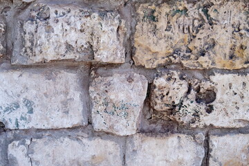 Masonry stone wall. Ancient medieval stone masonry.