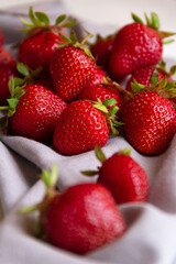 strawberries in a bowl on a white background