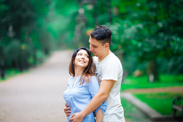 Obraz premium Couple in a forest, warm summer, lovely weather