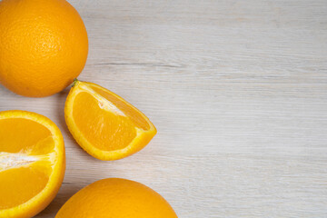 Photo with oranges on bleached wood. Background on the theme of fruit.