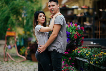 young couple posing on city background, travel concept