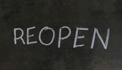 Reopen Word Written with White Chalk on Black Surface
