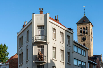 Fototapeta premium teddy bear on the balcony on an old house in De Panne beach in Belgium