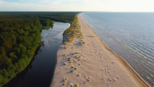 Irbe River Meets Baltic Sea Aerial Dron Shoot. The River in Latvia of Irbe Flows Into the Baltic Sea.