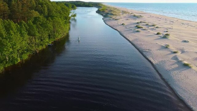 Irbe River Meets Baltic Sea Aerial Dron Shoot. The River in Latvia of Irbe Flows Into the Baltic Sea.