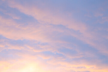 Naklejka na ściany i meble sunset sky and soft lilac clouds, background for text, background