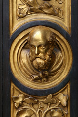 Fototapeta na wymiar Gate of Paradise bronze sculpture details, baptistery of Florence, Italy, famous touristic place