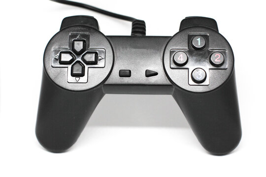 Isolated black game controller.