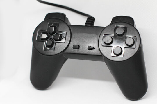 Isolated black game controller.