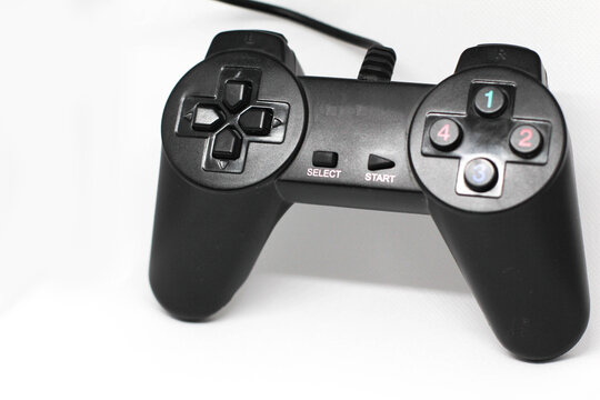 Isolated black game controller.