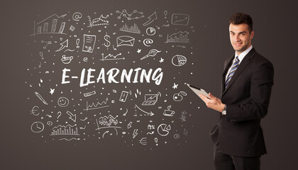 Businessman thinking with E-LEARNING inscription, business education concept