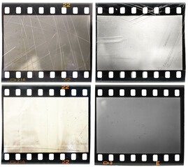set of vintage looking 35mm film strips on white background, blank 35mm film snips with scratches...