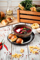 Russian beetroot soup borscht with beets and buns 