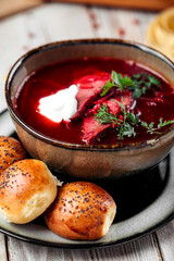 Russian beetroot soup borscht with beets and buns 