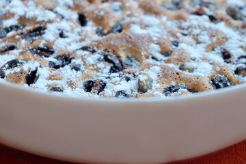 cherry pie on a white dish close up.