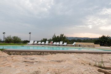 Fototapeta na wymiar Sicilian rock garden with pool