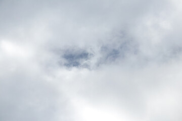 White puffy clouds with a hint of blue 